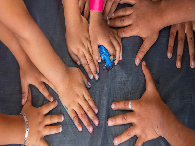 UNICEF / Luis Kelly. Niños migrantes juegan en un espacio de UNICEF en el estadio Jesús Martínez 'Palillo" en la Ciudad de México. Noviembre de 201